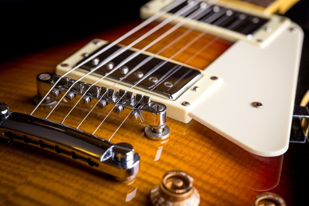close-up-of-music-guitar-e1648447296348.jpg